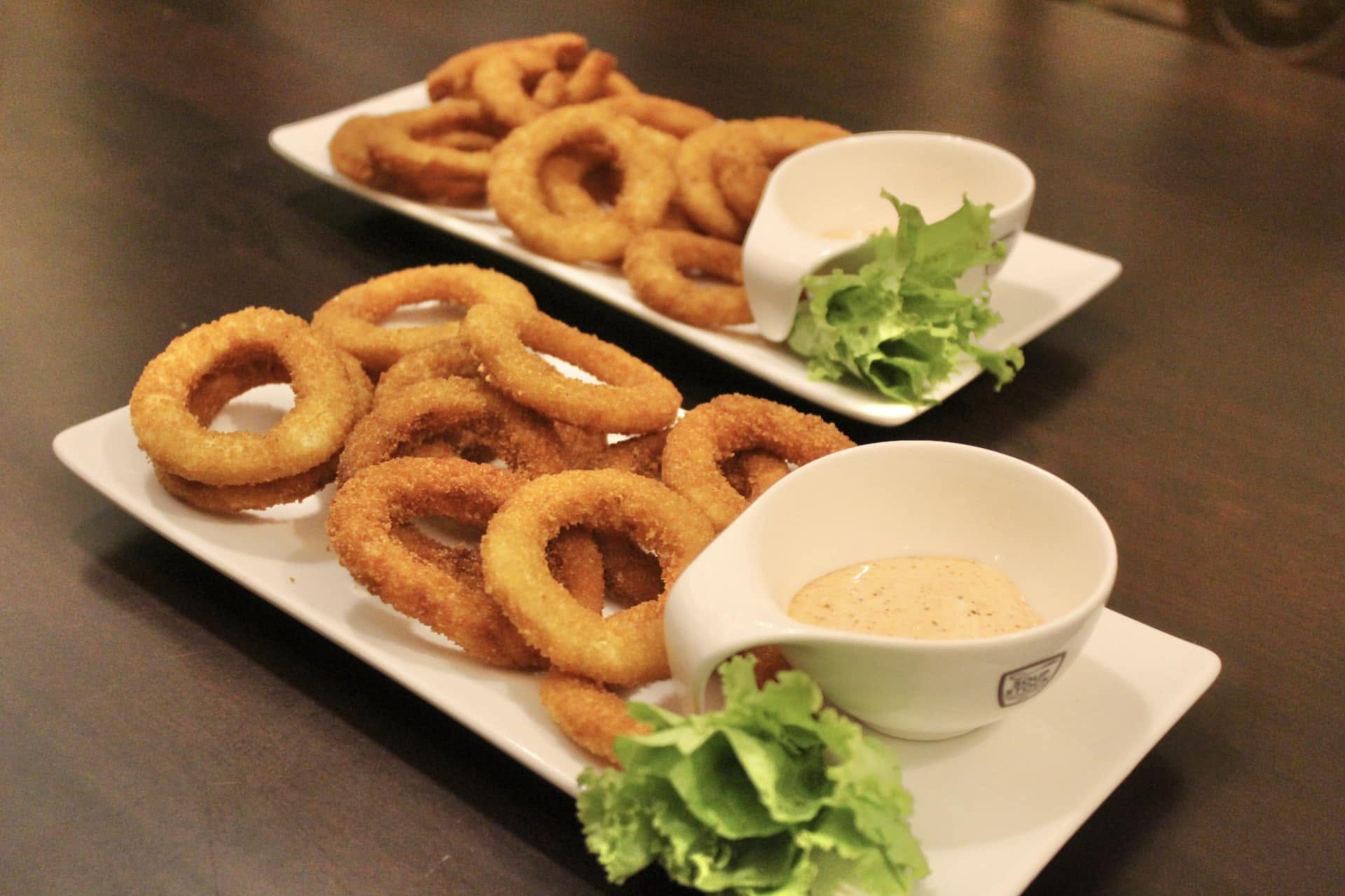 Golden crispy calamari rings with house-made aioli